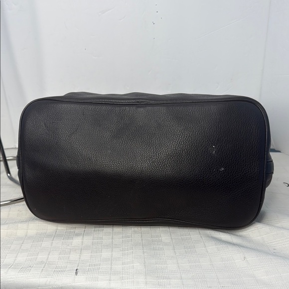 The image shows a Michael Kors Colgate Reversible Grab Bag in black. - Picture 5 of 11